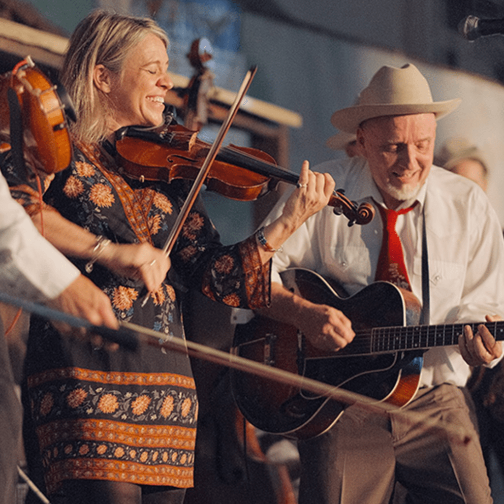 Woman and man playing musical instruments