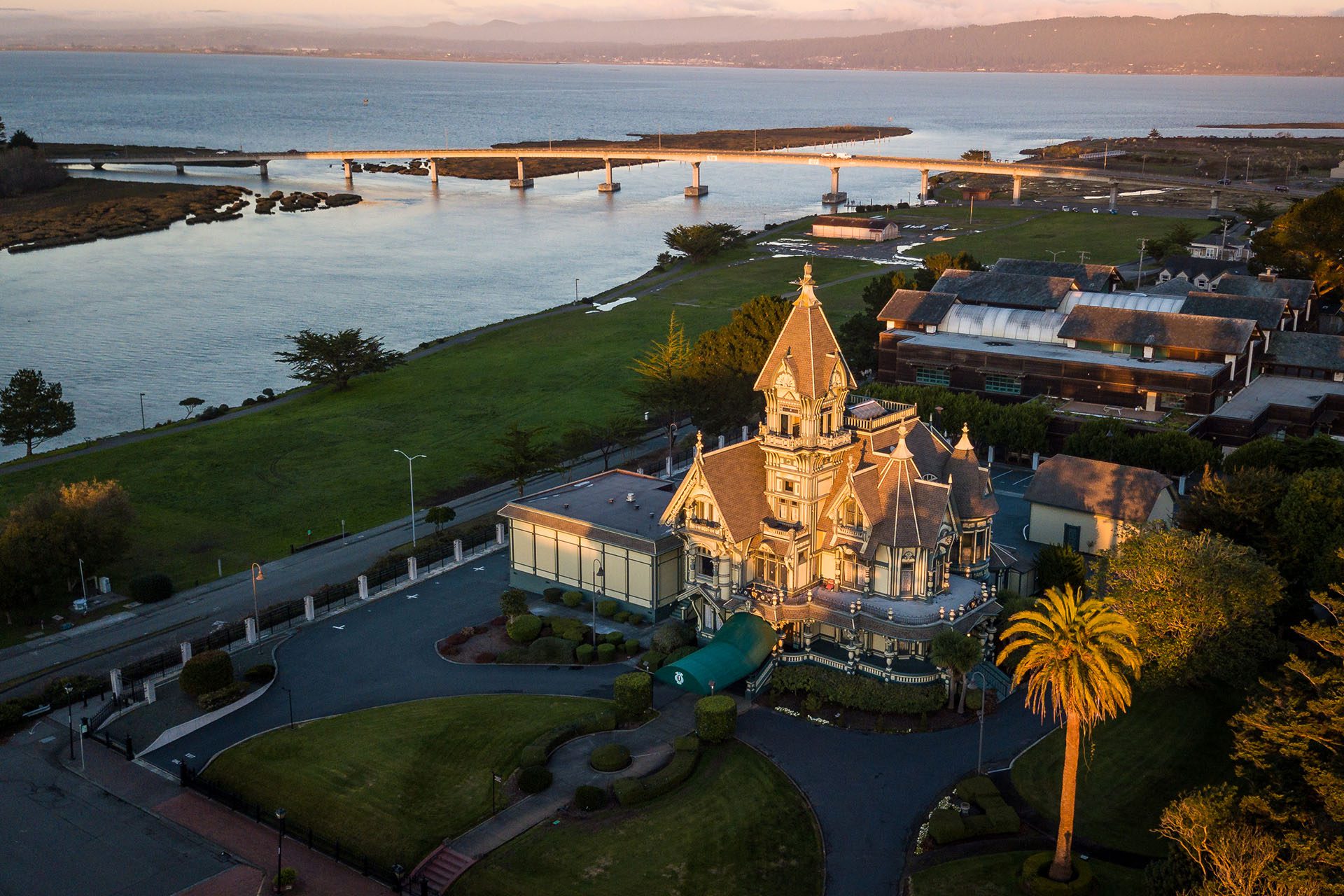 Birds eye view of Carson Mansion during a sunset